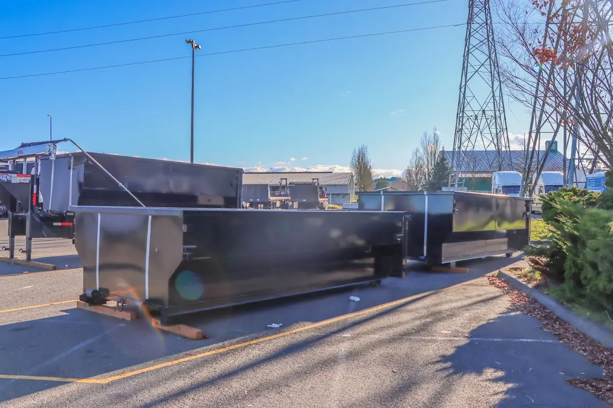 Roll-off dumpster ready for waste disposal at job site for 8 Yard Dumpster Rental in Milton